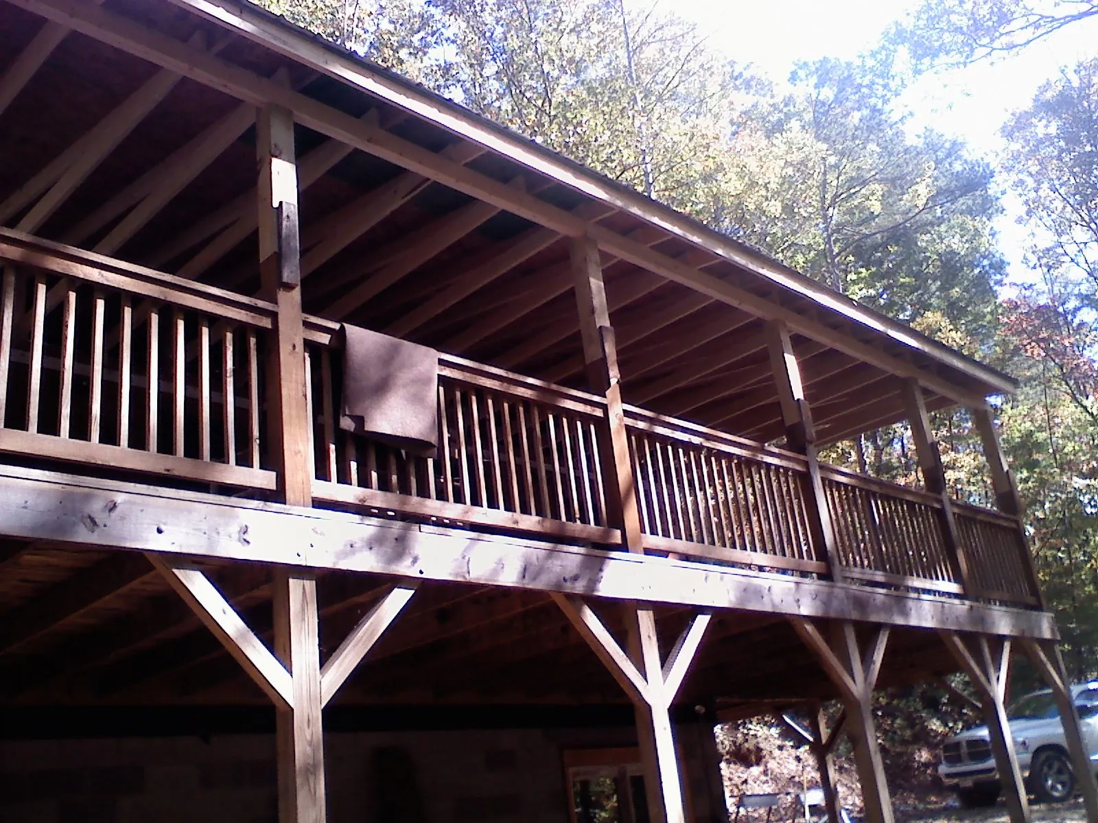 Timber framing under a new elevated porch and deck — Roof Leak Repair in Caruthers by Roofing Brothers